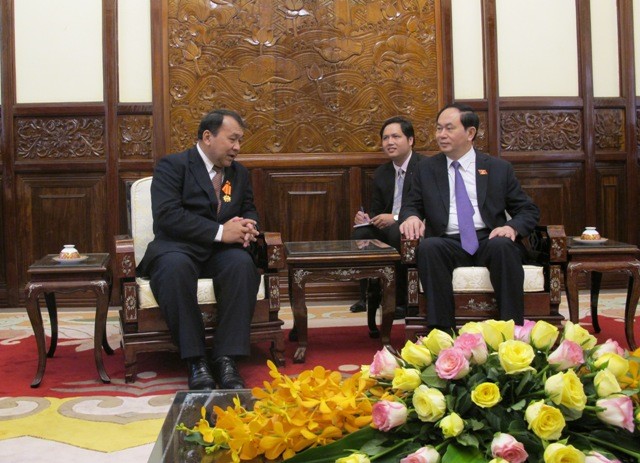 President Tran Dai Quang receives out-going Cambodian Ambassador - ảnh 1